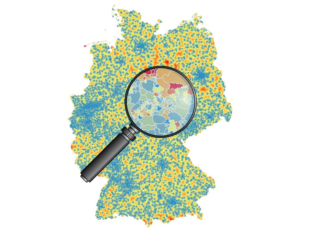 Eine farbige Deutschlandkarte, bei der ein Teil mit einer Lupe vergrößert wird.