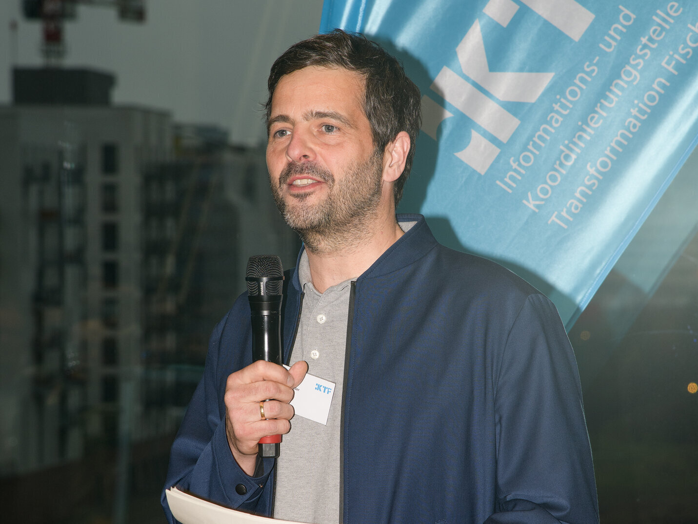 Daniel Schneider, Head of the IKTF, welcomes guests at the reception. Portrait of a person.