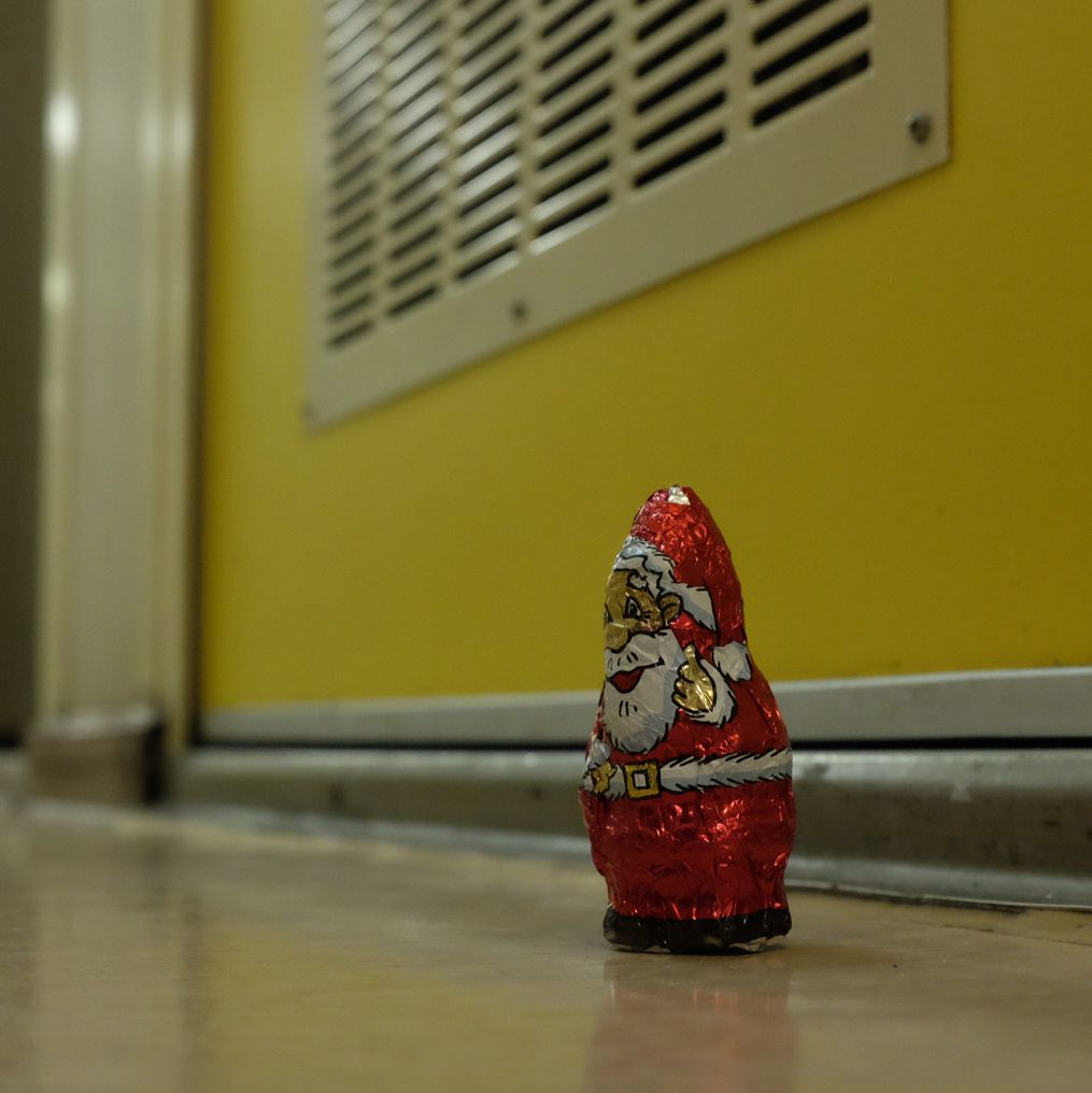 A chocolate Father Christmas in the hallway outside the chamber door