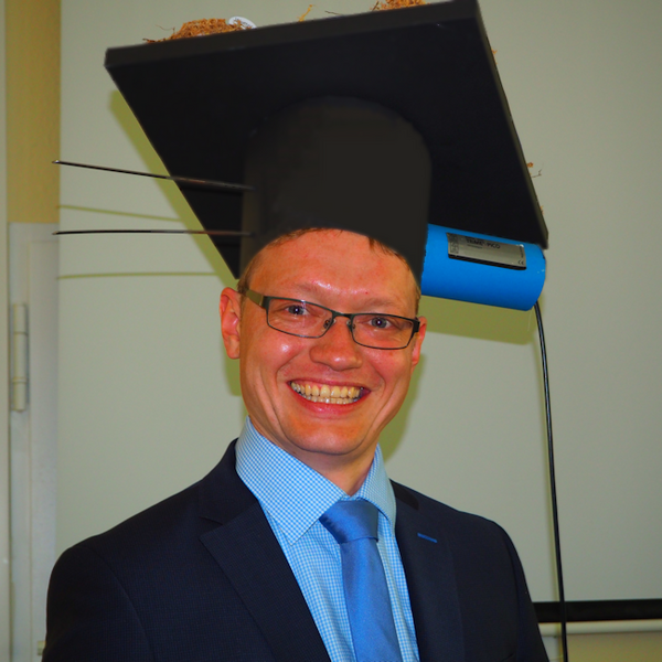 Ullrich Dettmann with doctoral cap