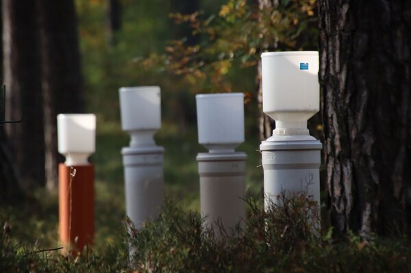 Precipitation gauge on a test area.