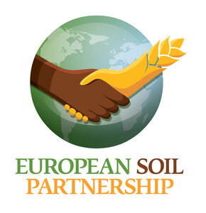 Logo of the European Soil Partnership shows the earth globe and two hands reach out, one black one yellow