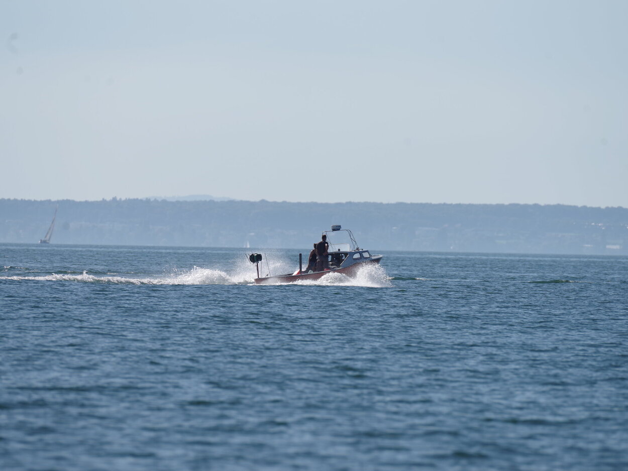 A boat sails in the water.