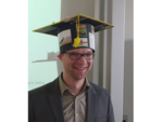 Christoph Buschmann mit Doktorhut