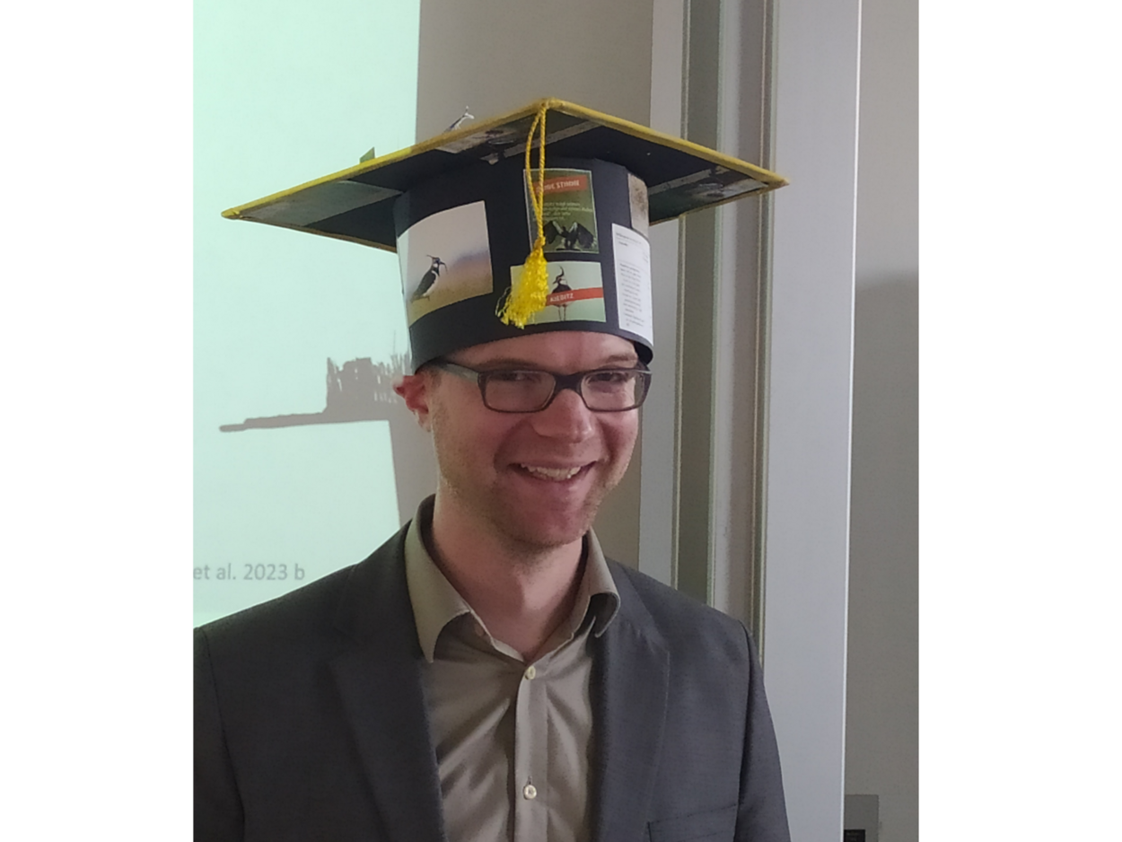 Christoph Buschmann mit Doktorhut