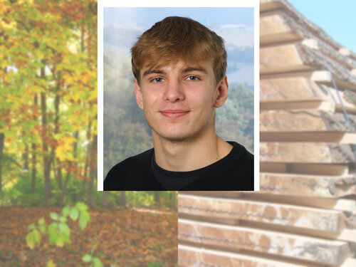 Portrait of Nick Lagrain with an autumn forest and a tree trunk cut into longitudinal slices in the background.