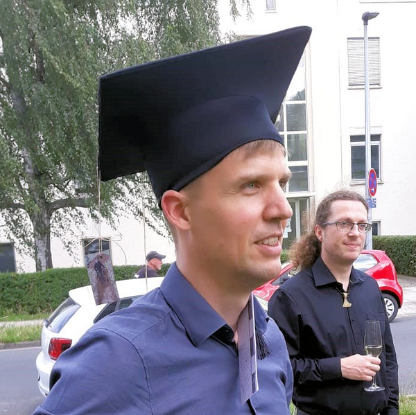 Fabian Kalks with doctoral cap