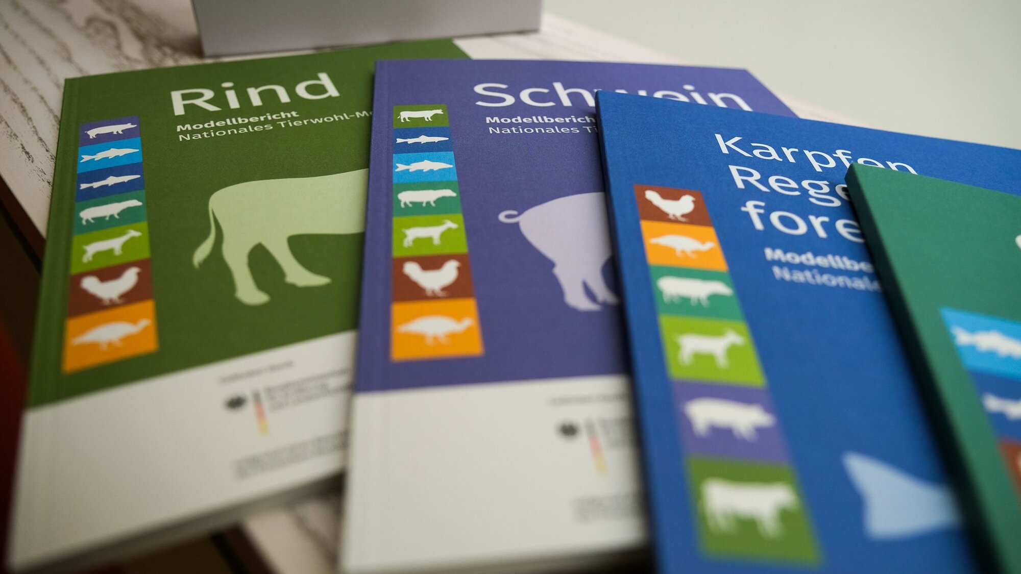 Das Bild zeigt die NaTiMon-Modellberichte für die verschiedenen Nutztierarten. 