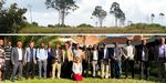 A group photo of the workshop and a photo of shifting cultivation as the prevalent cause of degraded forest landscapes in the tropics (here Zambia)