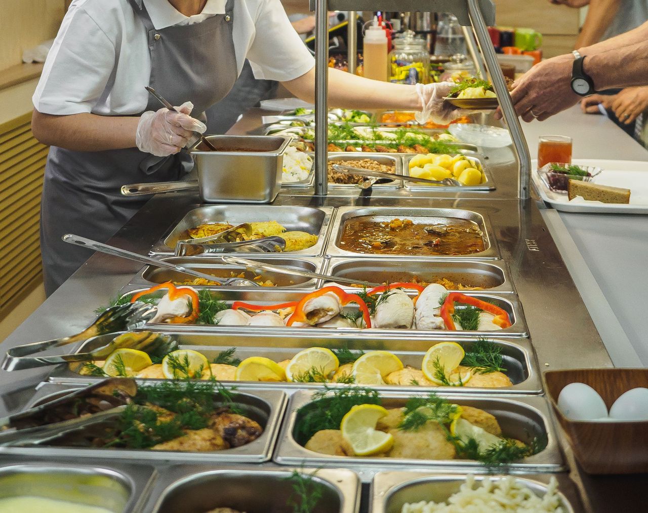 Cuisine cafeteria buffet with food. Self-service food display sh