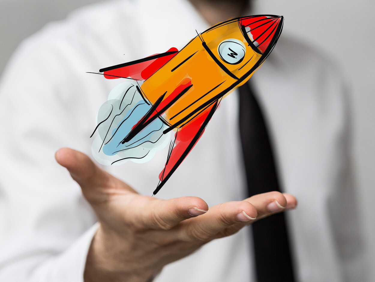 Brustbild einer Person ohne Kopf von der Hand steigt eine gemalte Comicrakete auf.