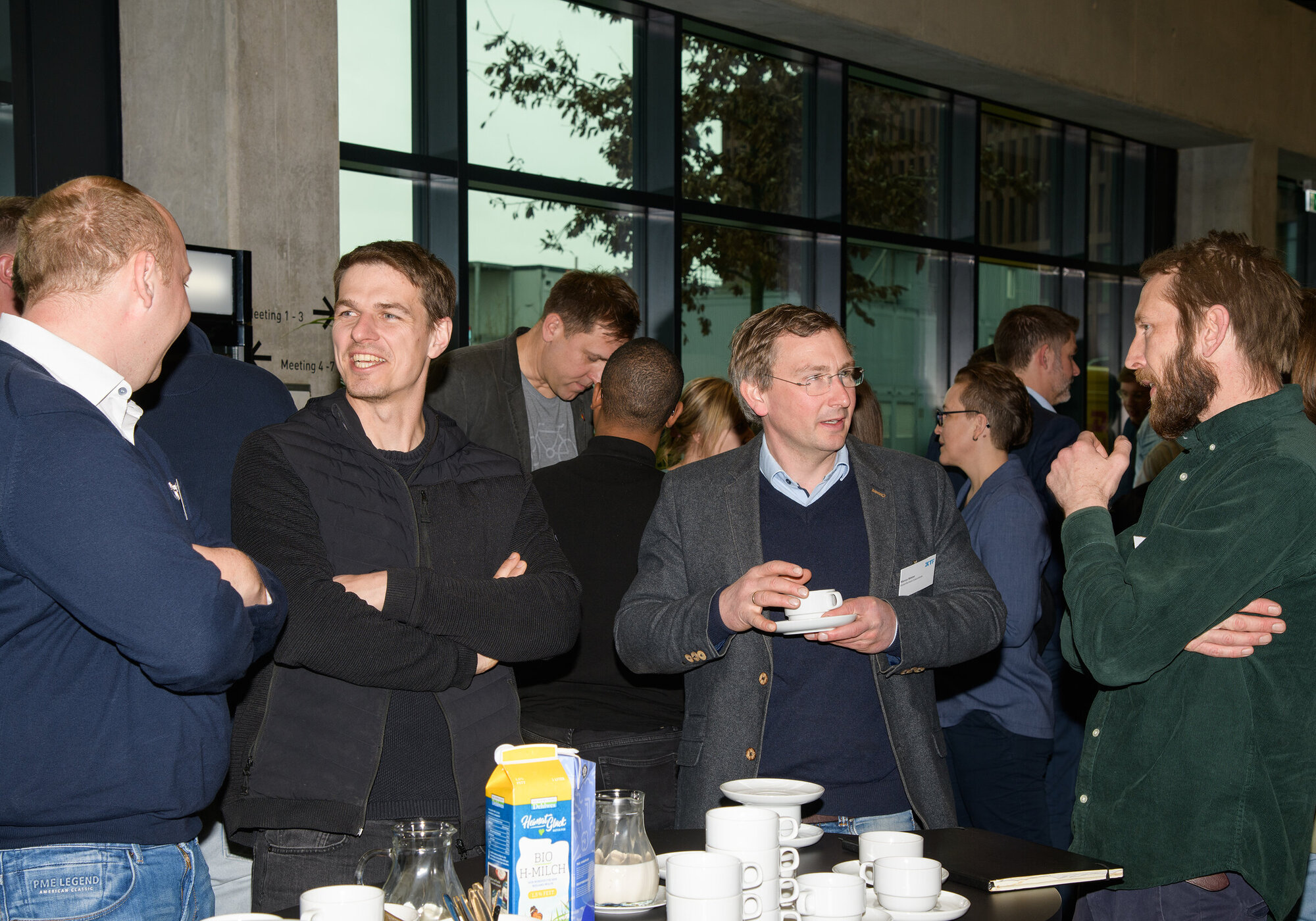 Among the guests were also many fishermen from the North Sea and the Baltic Sea. Pictures from the event showing lots of people chatting.