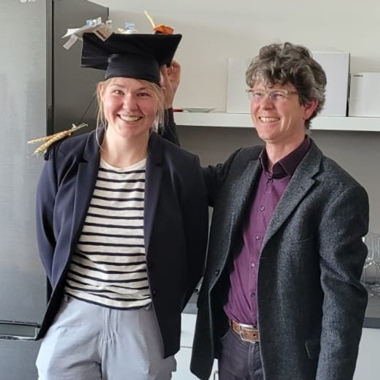 Henrike Heinemann with doctoral cap and one of her supervisors