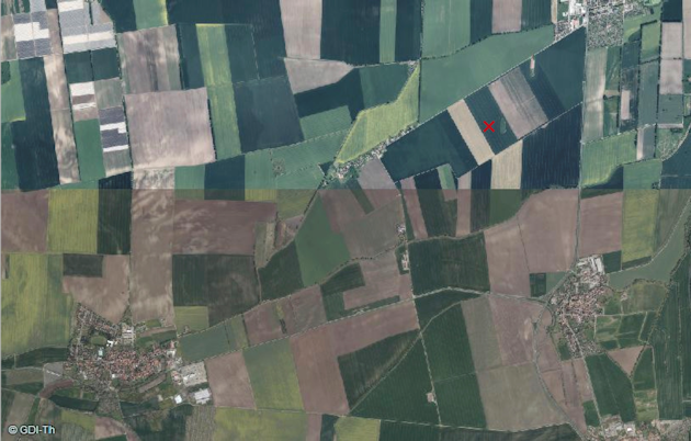 Areal photograph of the agricultural region around the flux tower (red cross)